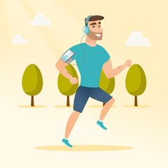 Young man running with earphones and smartphone.