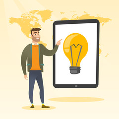 Caucasian man pointing at a big tablet computer.