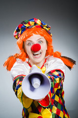 Funny clown in comical concept