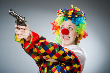 Funny clown in comical concept