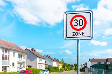 Speed limit sign to 30 in the suburbs