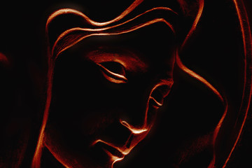 silhouette of Virgin Mary on black background