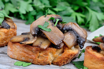 Group of mushroom bruschetta on table