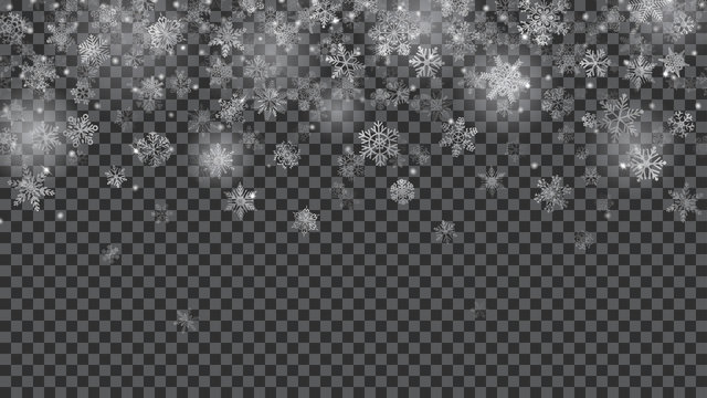 Christmas background of translucent falling snowflakes
