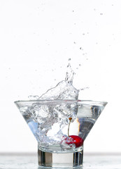 cherry dropped in bowl