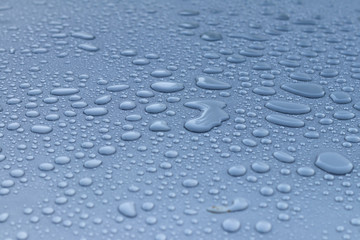 Dew drops on the roof of the car.