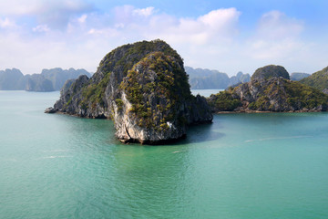 Fototapeta premium Halong Bay, Vietnam. Limestone Islands with cloudy sky