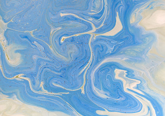 Marbled blue abstract background. Liquid marble pattern