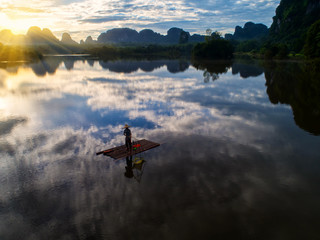 People fishing in river in Thailand. It is a rural lifestyle,Morning light , background blurred ,aerial view , top view