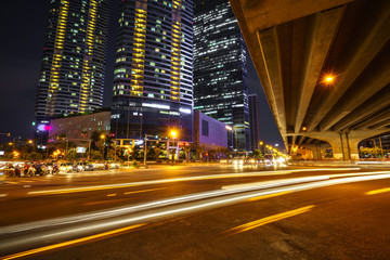 Fototapeta na wymiar Night scene of modern city with light trails.