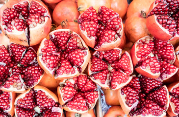 Cut and Seeds of ripe pomegranate