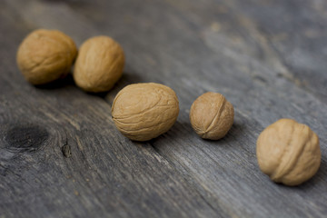 walnut on wooden background