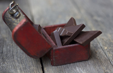 chocolate on old wooden plank
