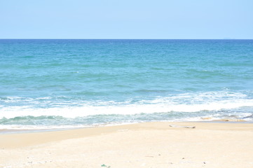 Fototapeta na wymiar Blue sky beach white sand