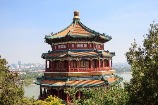 Fototapeta View on Pagoda tower in the Summer Palace imperial park in Beijing, China with the city in the background