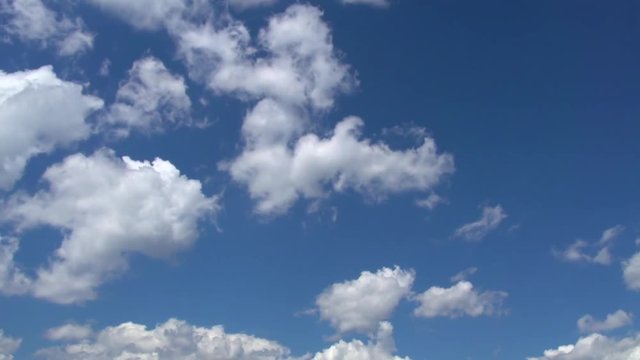 Clouds in the sky. Movement of white clouds against a blue sky.  Time lapse. Full HD 1080p. Timelapse 
