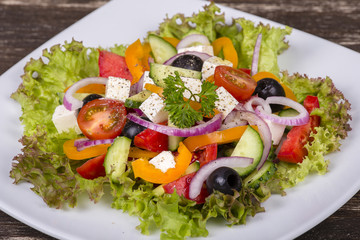 Fresh vegetable greek salad on the table