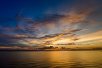 Fototapeta na wymiar Twilight sky after sunset over the lake.