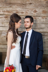 Happy wife and groom in their wedding day. Just married couple