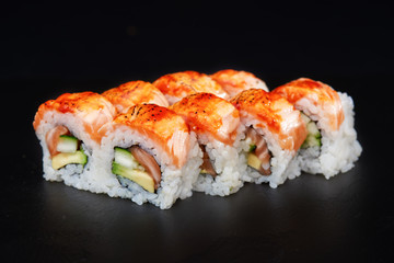 Sushi on black background. Perfect for creating sushi restaurant menu. Part of series.