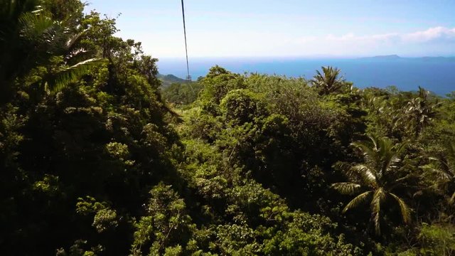 View from zip line in Puerto Galera, Philippines, filmed with electronic stabilizer