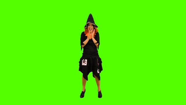 The witch cooks a magical potion for spell greenscreen  shot with alpha channel 