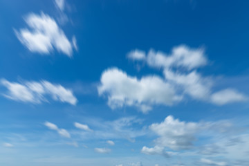 Blue Sky with motion clouds.