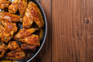 Baked wings, served with dip or baked potatoes.