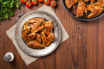 Baked wings, served with dip or baked potatoes.