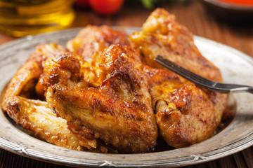 Baked wings, served with dip or baked potatoes.