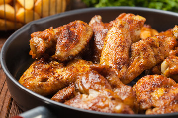 Baked wings, served with dip or baked potatoes.