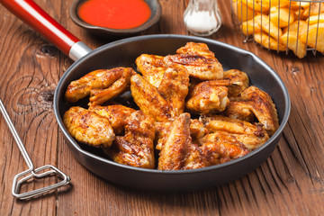 Baked wings, served with dip or baked potatoes.