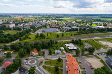 Aerial photography. Small city landscape, amazing clouds.