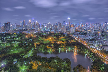 Obraz premium Twilight city tower building lights, cityscape downtown background