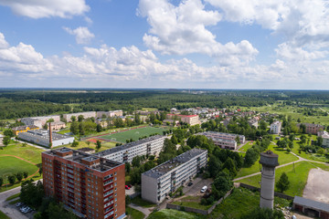 Obraz premium Aerial photography. Small city landscape, amazing clouds.
