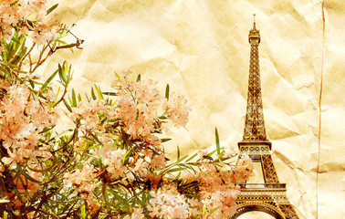 Fototapeta na wymiar Grunge background with texture of old paper and Eiffel tower