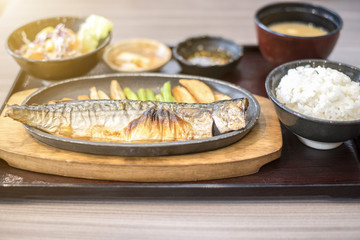grilled  fish with soy sauce with fresh vegetable salad / japanese food
