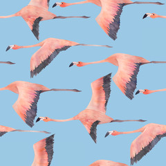A flying flock of flamingo in the sky. Watercolor seamless pattern. Hand drawn illustration