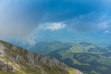 Fototapeta premium Beautiful mountain scenery with limestone rocks and storm clouds, in Piatra Craiului mountain range
