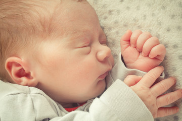 One month old baby. Sleeping