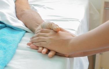Fototapeta na wymiar hospital patient hands to care