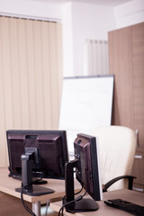Empty office room with computers and desks. Modern interior design