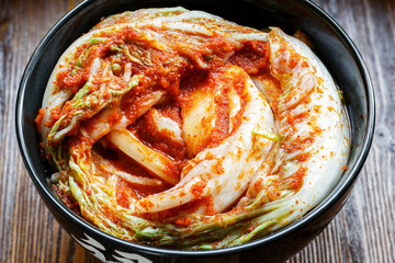 Traditional Korean kimchi appetizer. The concept of healthy fermented food.