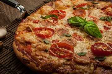 Delicious fresh pizza served on wooden table