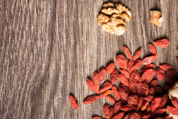 Raw organic food on wooden background in studio photo