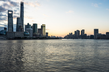 Fototapeta na wymiar Shanghai skyline,landmarks of Shanghai with Huangpu river at sunrise/sunset in China.