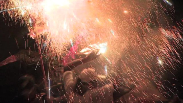 Crowd lights up Torito sending fireworks shooting out everywhere