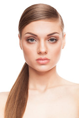 Fototapeta premium Beautiful model with natural make-up on white background. Studio photo