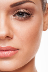 Naklejka premium Beautiful model with natural make-up on white background. Studio photo