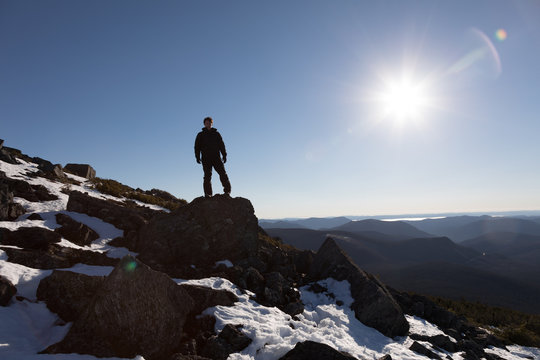 Victorious Man Enjoying the Success of the Richardson Mountain's Summit